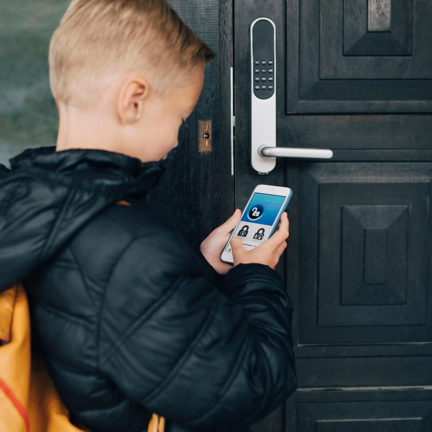 Young boy using mobile device