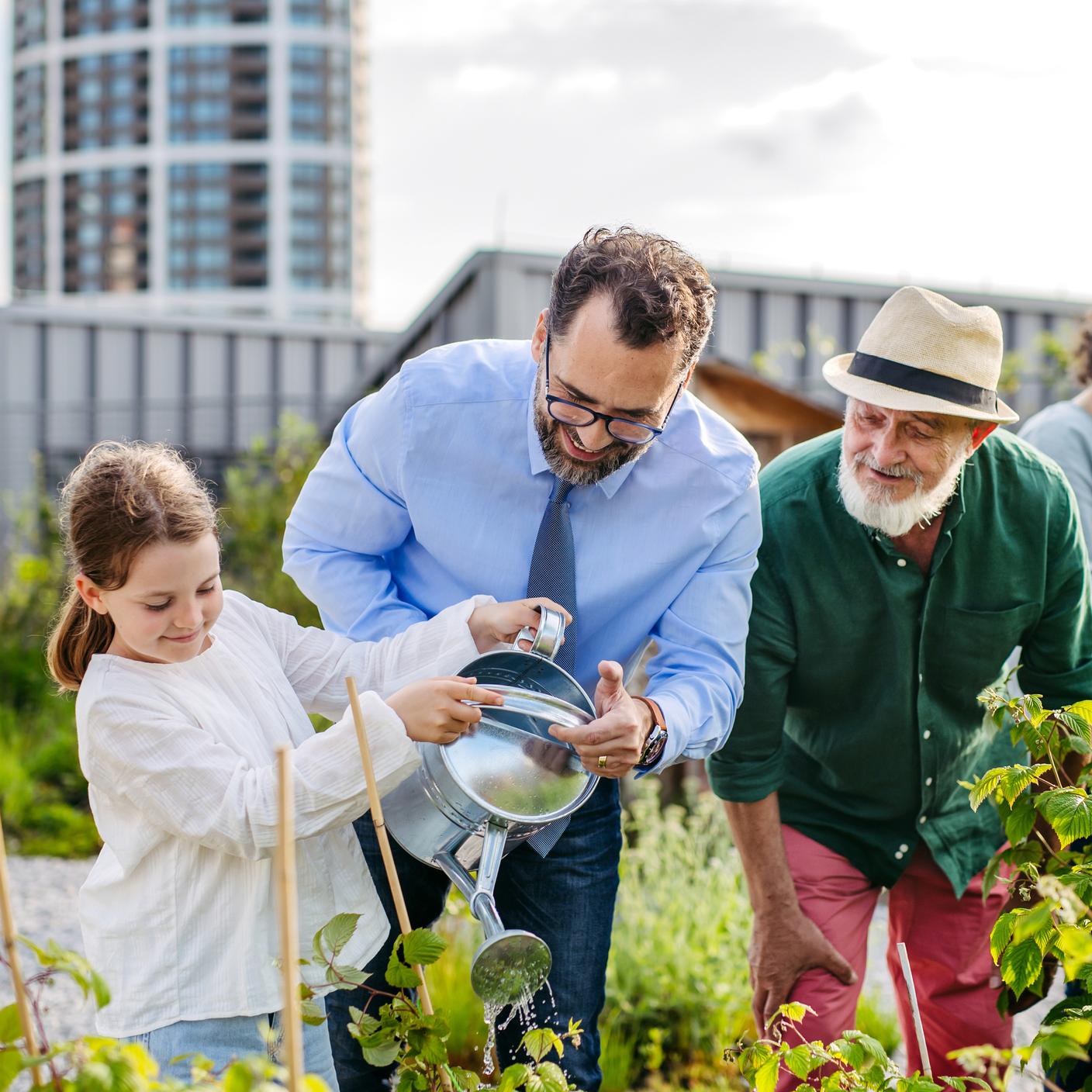 Food and Retail : A family gardening in a community garden