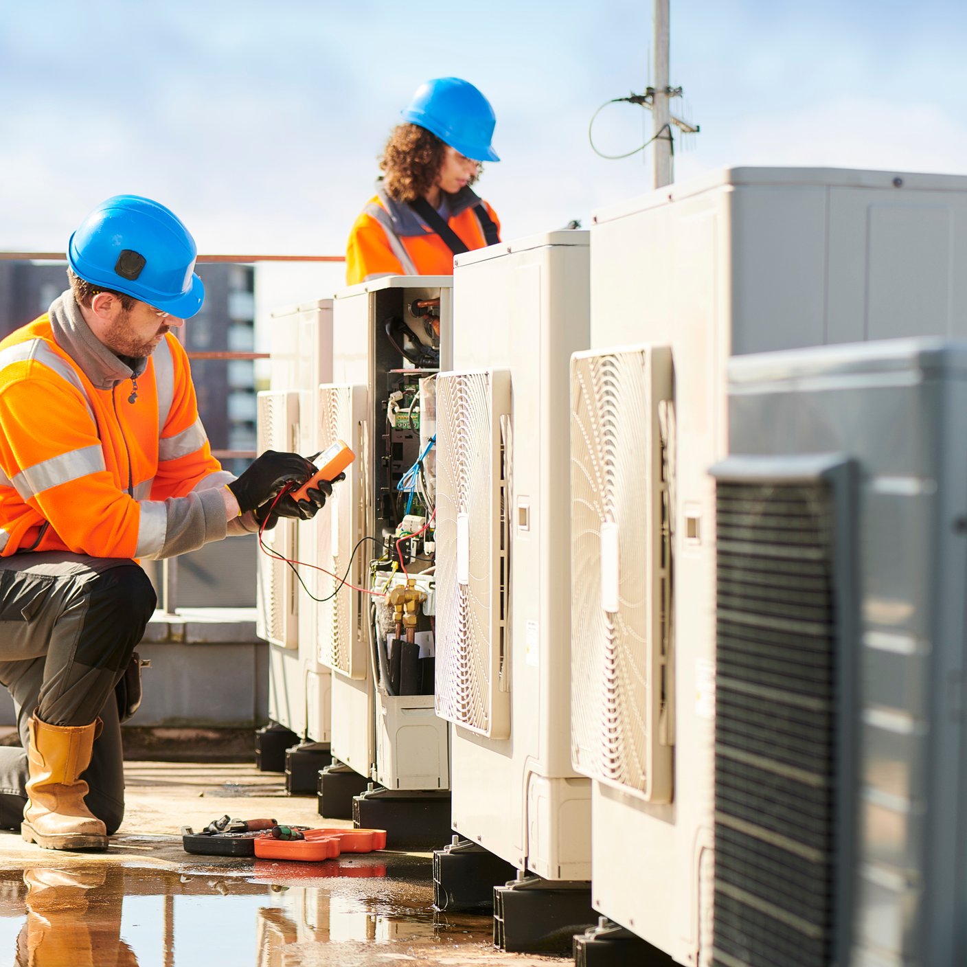 Engineers working on rooftop installations