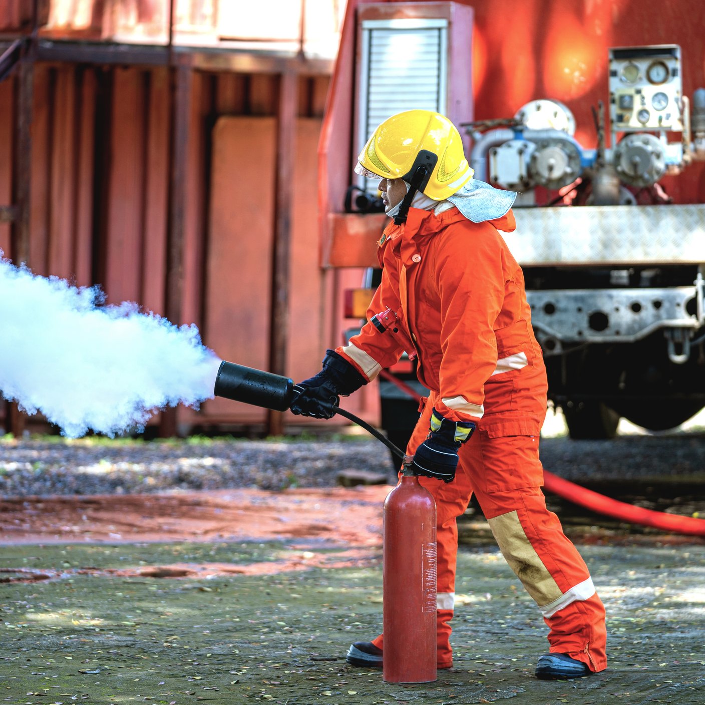 Portrait of firefighter wearing full equipment and emergency rescue equipment.