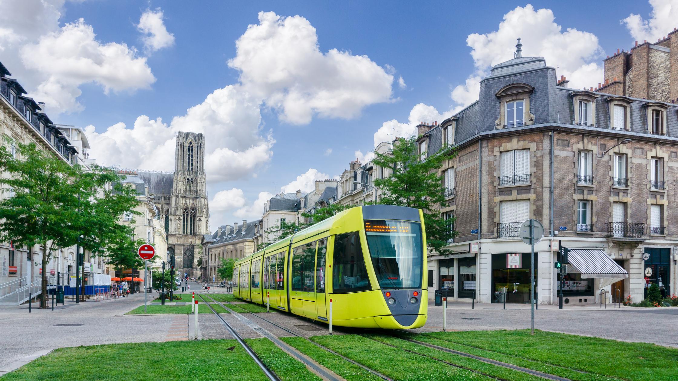 Tram traveling through city