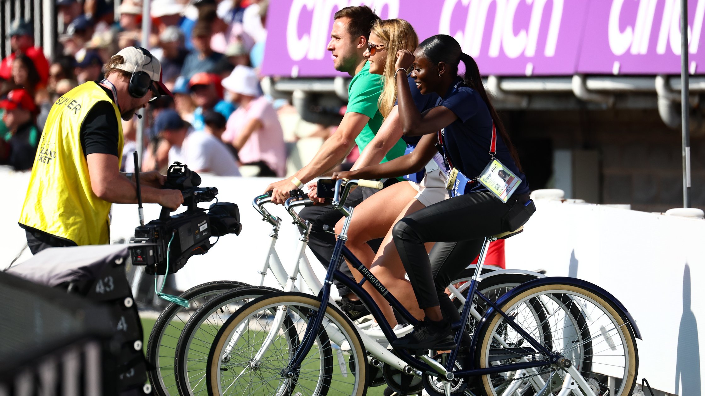 Multiple people on bikes.